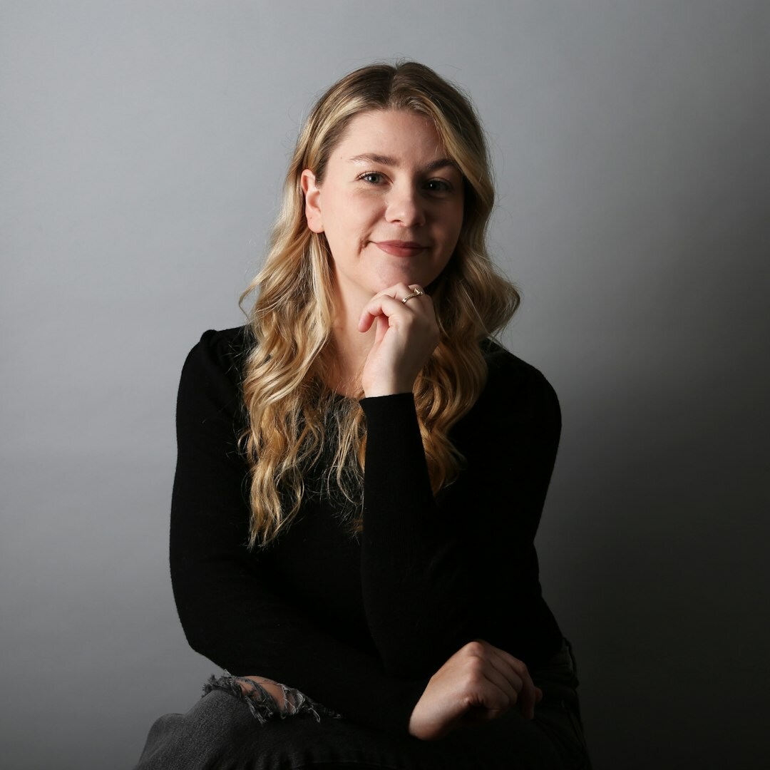 Studio portrait of a professional female journalist smiling
