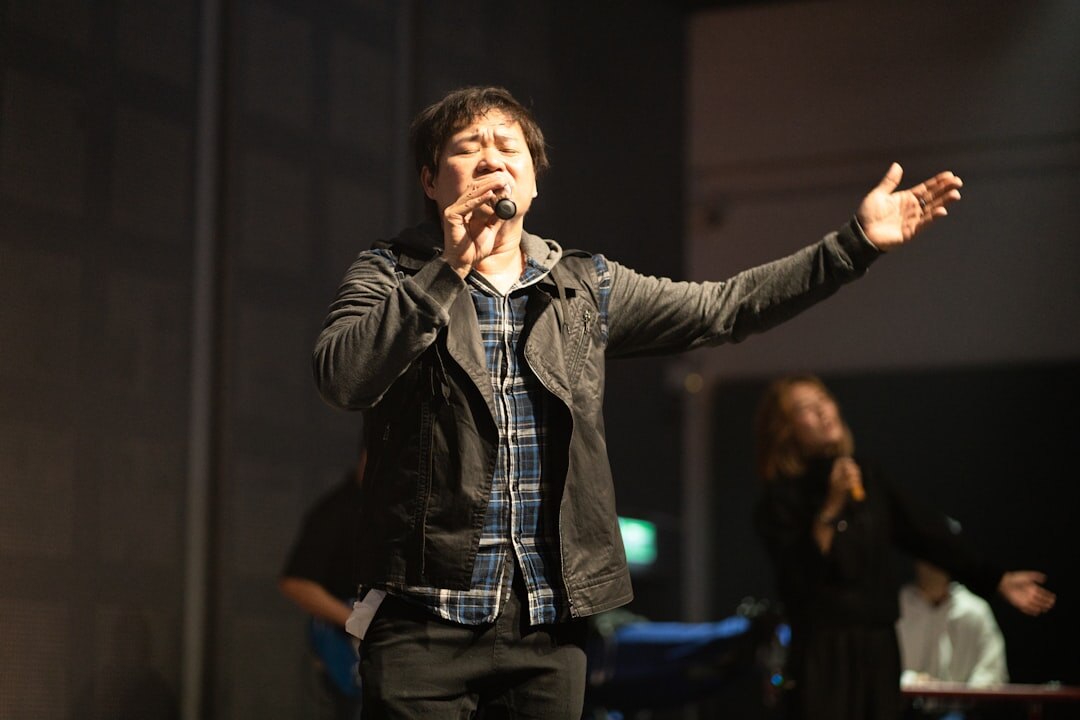 comedian on stage performing